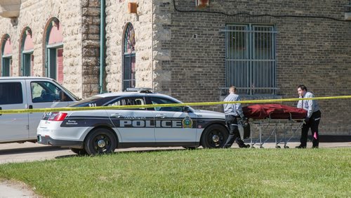 MIKE DEAL / WINNIPEG FREE PRESS
A body is taken away after the Winnipeg Police were called to the scene of what they are calling a suspicious death near the William Whyte Park Wednesday morning.
190619 - Wednesday, June 19, 2019.