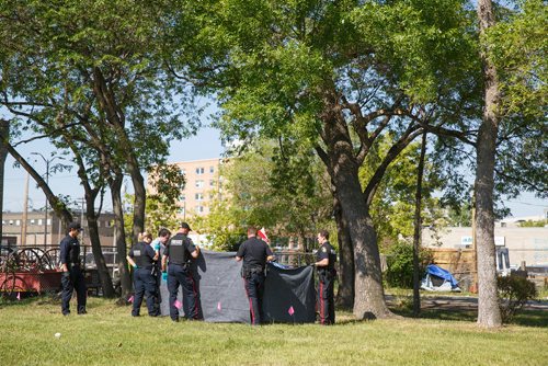 MIKE DEAL / WINNIPEG FREE PRESS
Winnipeg Police Forensics Unit on the scene of  what they are calling a suspicious death near the William Whyte Park Wednesday morning.
190619 - Wednesday, June 19, 2019.