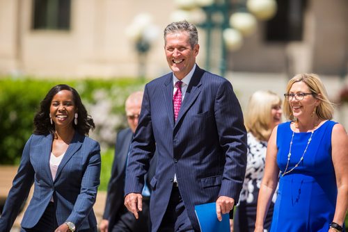 MIKAELA MACKENZIE / WINNIPEG FREE PRESS
Premier Brian Pallister walks up to a press conference announcing a September election date in front of the Manitoba Legislative Building with Southdale candidate Audrey Gordon, left, and Minister of Sustainable Development Rochelle Squires in Winnipeg on Wednesday, June 19, 2019. For Larry/Dan story.
Winnipeg Free Press 2019.