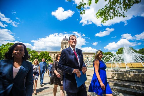 MIKAELA MACKENZIE / WINNIPEG FREE PRESS
Premier Brian Pallister walks up to a press conference announcing a September election date in front of the Manitoba Legislative Building with Southdale candidate Audrey Gordon, left, and Minister of Sustainable Development Rochelle Squires in Winnipeg on Wednesday, June 19, 2019. For Larry/Dan story.
Winnipeg Free Press 2019.