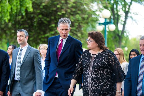 MIKAELA MACKENZIE / WINNIPEG FREE PRESS
Premier Brian Pallister walks away after announcing a September election date in front of the Manitoba Legislative Building with his cabinet  in Winnipeg on Wednesday, June 19, 2019. For Larry/Dan story.
Winnipeg Free Press 2019.