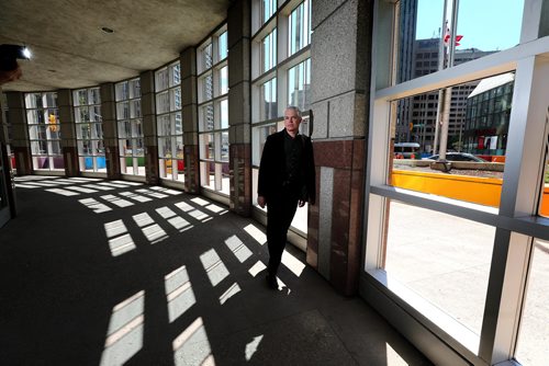 RUTH BONNEVILLE /  WINNIPEG FREE PRESS 

BIZ - 201 Portage walkway

Environmental portrait of Michael Banman, principal, Stantec Architecture, standing in enclosure that was designed by Stantec.  

Monday's real estate story, about the covered, glassed-in walkway on the ground floor of 201 Portage, at the NW corner of Portage and Main and how it may be converted into office space.  

Space is used by smokers trying to get out of the weather to have a cigarette.  


Solomon Israel story. 

June 20th, 2019
