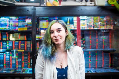 MIKAELA MACKENZIE / WINNIPEG FREE PRESS
Cobra Collectibles manager Kailyn Gregorash poses for a photo in front of shelves full of Nintendo Entertainment Systems in the store in Winnipeg on Thursday, June 20, 2019. For Declan story.
Winnipeg Free Press 2019.