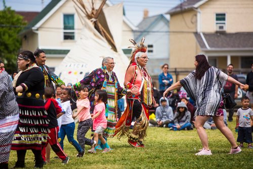 MIKAELA MACKENZIE / WINNIPEG FREE PRESS
Flora and Henry Ruck lead the big group dance at Aboriginal Day festivities at the Freighthouse Community Centre in Winnipeg on Friday, June 21, 2019. 
Winnipeg Free Press 2019.