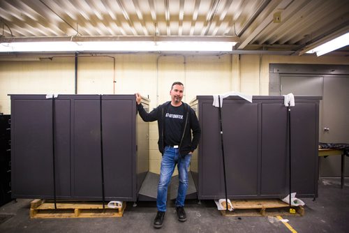 MIKAELA MACKENZIE / WINNIPEG FREE PRESS
Tom Prudhomme, manufacturing technician, shows the new shopping cart lockers at Red River College in Winnipeg on Friday, June 21, 2019. For Tessa Vanderhart story.
Winnipeg Free Press 2019.