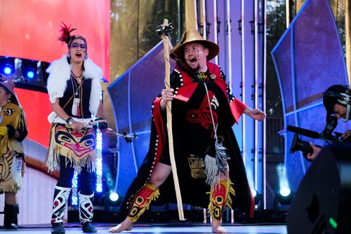 Daniel Crump / Winnipeg Free Press. The Dakhká Khwáan Dancers with DJ Dash perform during APTN Indigenous Day Live 2019 at the Forks, Winnipeg. June 19, 2019.