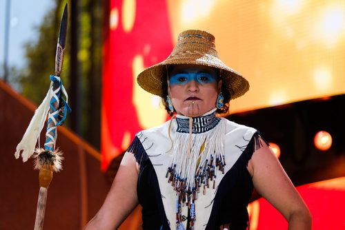 Daniel Crump / Winnipeg Free Press. The Dakhká Khwáan Dancers with DJ Dash perform during APTN Indigenous Day Live 2019 at the Forks, Winnipeg. June 19, 2019.