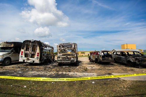 MIKAELA MACKENZIE / WINNIPEG FREE PRESS
Police tape surrounds burned-out cars and minibuses on Wall Street in Winnipeg on Tuesday, June 25, 2019. Standup.
Winnipeg Free Press 2019.