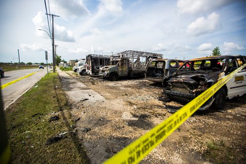 MIKAELA MACKENZIE / WINNIPEG FREE PRESS
Police tape surrounds burned-out cars and minibuses on Wall Street in Winnipeg on Tuesday, June 25, 2019. Standup.
Winnipeg Free Press 2019.