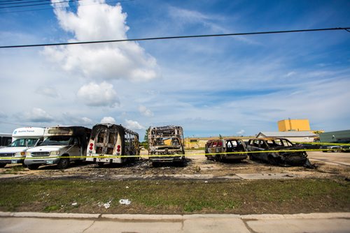 MIKAELA MACKENZIE / WINNIPEG FREE PRESS
Police tape surrounds burned-out cars and minibuses on Wall Street in Winnipeg on Tuesday, June 25, 2019. Standup.
Winnipeg Free Press 2019.