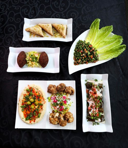RUTH BONNEVILLE /  WINNIPEG FREE PRESS 


Resto review - Beaurivage Authentic Lebanese Cuisine. 
788 Corydon Ave

Set dinner menu with 3 options, light, supreme or extravaganza all prepared  by Chef George Chamaa.  
Photos of various dishes from lunch and dinner menu. 

Double appetizer plate.  Hummus, a blend of tahini and lemon, topped with parsley and served with pita wedges and Rosettes, cauliflower steamed and golden fried with tahini sauce.  

Stuffed grape leaves. Rice, onion, tomato, mild special spices flambeed in garlic and mint sauce.  Topped with tahini sauce.  

Kibbi Balls.  A Lebanese delicacy, fresh eye of round minced 3 times, mixed with burgle wheat, onion and mild spices. Filled with ground sirloin, onion and mild spices, served with house salad.  

Tabbouleh Salad. Authentic Lebanese blend of parsley, fresh mint, green onions, tomatoes, burgle wheat chopped fine and mixed with fresh lemons and virgin olive oil.  Served on a bed of romaine lettuce.  


Dessert, traditional Baklava served with Lebanese coffee.  


See review.  

June 24, 2019

