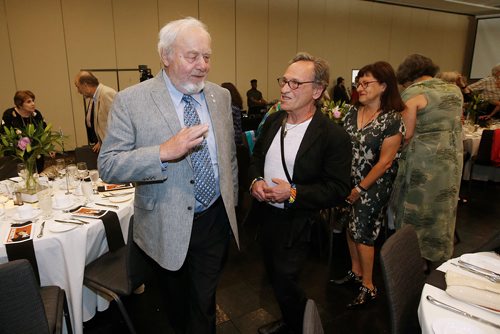 JOHN WOODS / WINNIPEG FREE PRESS
Former NDP premier and governor-general Ed Schreyer, left, speaks with Allan Cohen, ministerial assistant to the Minister of Finance during the Scheyer years in power, as they enter a dinner today, Tuesday, June 25, 2019, which honoured Schreyer and the NDPs first election win in Manitoba 50 years ago today. 

Reporter:standup