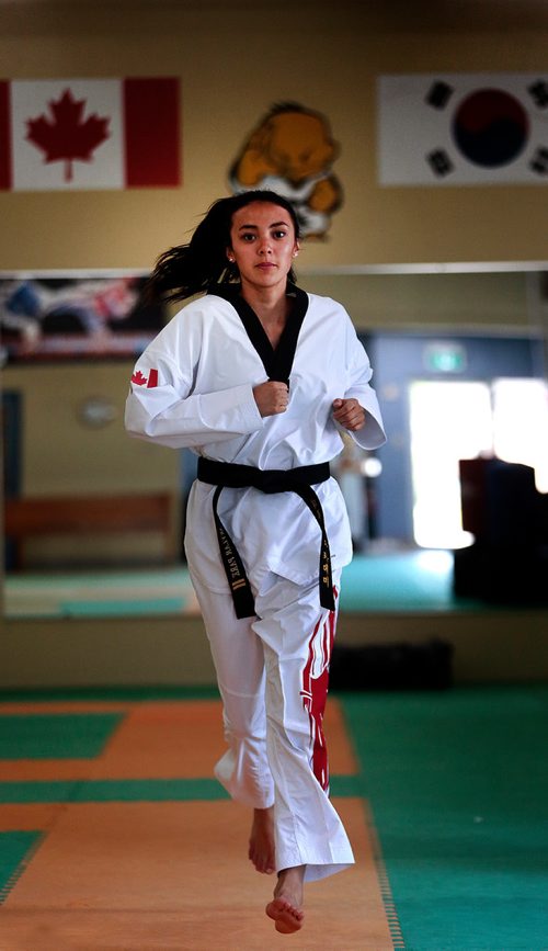 PHIL HOSSACK / WINNIPEG FREE PRESS -Skylar Park  (centre) is a 20 y.o. female from Winnipeg who recently won bronze at the World Taekwondo Championships and is headed to the Pan Am Games to represent Canada.  - June 27, 2019.