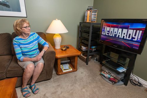 SASHA SEFTER / WINNIPEG FREE PRESS
Amanda Steadman watches a saved copy of the episode of Jeopardy she was a contestant on in 2013 in her St Vital home.
190703 - Wednesday, July 03, 2019.