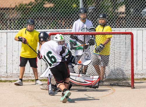 SASHA SEFTER / WINNIPEG FREE PRESS
A player from the Smokin Aces takes a shot on the NCN Steelers goal during the second annual Manitoba Indigenous Youth Ball Hockey Tournament held at the Norberry-Glenlee Community Centre.
190706 - Saturday, July 06, 2019.