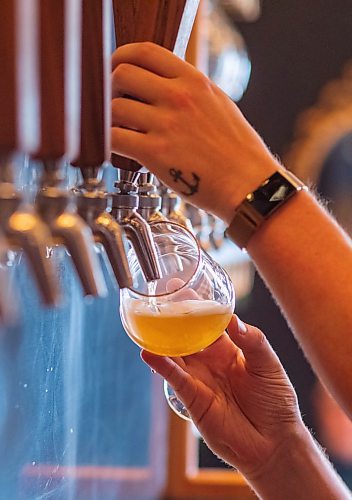 SASHA SEFTER / WINNIPEG FREE PRESS
Taproom manager Zack Clarke pours a beer in Nonsuch Brewing Co.
190706 - Saturday, July 06, 2019.