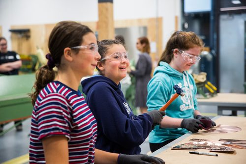 MIKAELA MACKENZIE / WINNIPEG FREE PRESS
Mia Gutarts, 13 (centre), and Avery Delaney, 14 (left) and Julie Leroux, 12, try out different ways of texturing their copper lamp bases at the Girls Exploring Trades and Technology at Red River College in Winnipeg on Tuesday, July 9, 2019. For Nadya Pankiw story.
Winnipeg Free Press 2019.