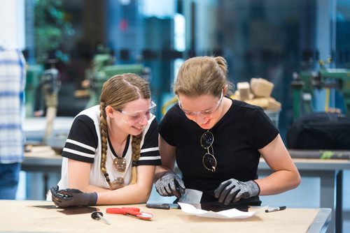 MIKAELA MACKENZIE / WINNIPEG FREE PRESS
Grace Alice Holt Frank (left) and Mackenzie Klein try out different ways of texturing their copper lamp bases at the Girls Exploring Trades and Technology at Red River College in Winnipeg on Tuesday, July 9, 2019. For Nadya Pankiw story.
Winnipeg Free Press 2019.