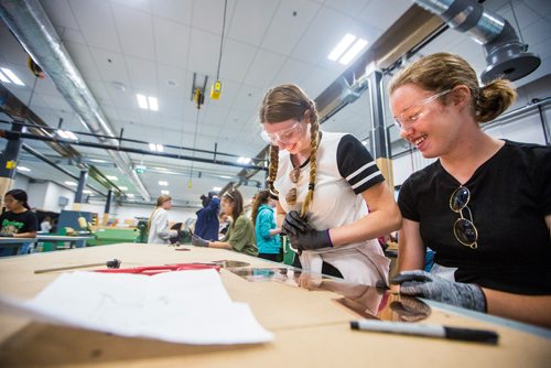 MIKAELA MACKENZIE / WINNIPEG FREE PRESS
Grace Alice Holt Frank (left) and Mackenzie Klein try out different ways of texturing their copper lamp bases at the Girls Exploring Trades and Technology at Red River College in Winnipeg on Tuesday, July 9, 2019. For Nadya Pankiw story.
Winnipeg Free Press 2019.