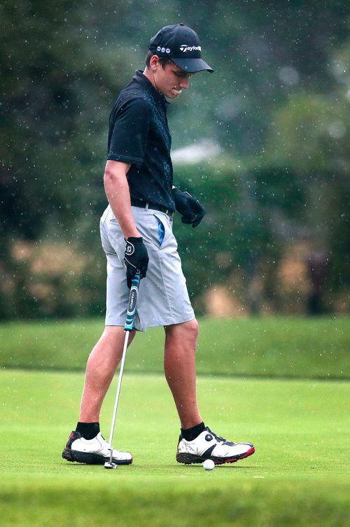 PHIL HOSSACK / WINNIPEG FREE PRESS - Braxton Kuntz talks to his ball on a green at the Manitoba Jr Men's tournament at Elmhurst Golf and Country Club Tuesday. Devon's story. - July 9, 2019.