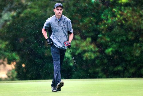 PHIL HOSSACK / WINNIPEG FREE PRESS - Jacob Armstrong beams after chipping into the hole on the 15th green at the Manitoba Jr Men's tournament at Elmhurst Golf and Country Club Tuesday. Devon's story. - July 9, 2019.