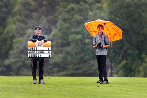 PHIL HOSSACK / WINNIPEG FREE PRESS - Jacob Armstrong beams at the leader board on the 16th fairway after tying Braxton Kuntz at the Manitoba Jr Men's tournament at Elmhurst Golf and Country Club Tuesday. Armstrong went on to defeat Kuntz. Devon's story. - July 9, 2019.