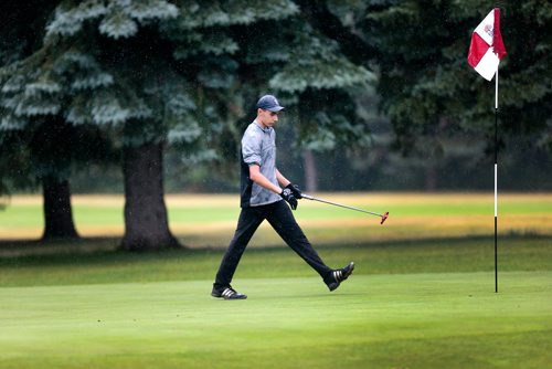 PHIL HOSSACK / WINNIPEG FREE PRESS -  Jacob Armstrong struts up to the flag to retrieve his ball after a long put to take the lead from Braxton Kuntz on the 17th green at the Manitoba Jr Men's title Tuesday at Elmhurst Golf and Country Club. Devon's story. - July 9, 2019.