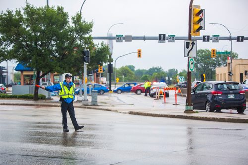 MIKAELA MACKENZIE / WINNIPEG FREE PRESS
Cadets and police direct morning traffic at Confusion Corner, where the lights have been out since 7:30pm on Tuesday, in Winnipeg on Wednesday, July 10, 2019. For Carol Sanders story.
Winnipeg Free Press 2019.