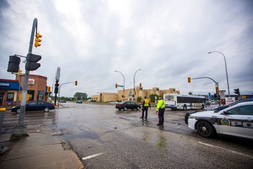 MIKAELA MACKENZIE / WINNIPEG FREE PRESS
Cadets and police direct morning traffic at Confusion Corner, where the lights have been out since 7:30pm on Tuesday, in Winnipeg on Wednesday, July 10, 2019. For Carol Sanders story.
Winnipeg Free Press 2019.