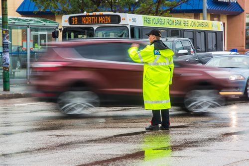 MIKAELA MACKENZIE / WINNIPEG FREE PRESS
Cadets and police direct morning traffic at Confusion Corner, where the lights have been out since 7:30pm on Tuesday, in Winnipeg on Wednesday, July 10, 2019. For Carol Sanders story.
Winnipeg Free Press 2019.