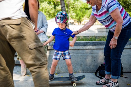 MIKAELA MACKENZIE / WINNIPEG FREE PRESS
Vaughn Mason, three, learns to skateboard with the help of his grandma, Judie Mason, at the free skateboarding lessons for beginners, put on by the Winnipeg Skateboarding Outreach Organization and Sk8 Skates, at the Forks skate park in Winnipeg on Wednesday, July 10, 2019. Standup.
Winnipeg Free Press 2019.