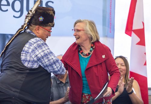 SASHA SEFTER / WINNIPEG FREE PRESS
(From left) Chief Glenn Hudson of Peguis First Nation shakes hands with Carolyn Bennett, Minister of Crown-Indigenous Relations at an event held at the urban reserve at 1075 Portage Avenue to mark the property officially becoming treaty land on Wednesday.
190710 - Wednesday, July 10, 2019.