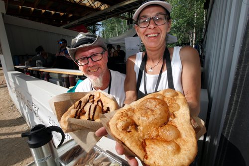 PHIL HOSSACK / WINNIPEG FREE PRESS - Whales Tales Sharon and Gary Doornsbosch show of the sweet and the savoury Whale's Tails at the Folk Festival Thursday. - July 11, 2019.