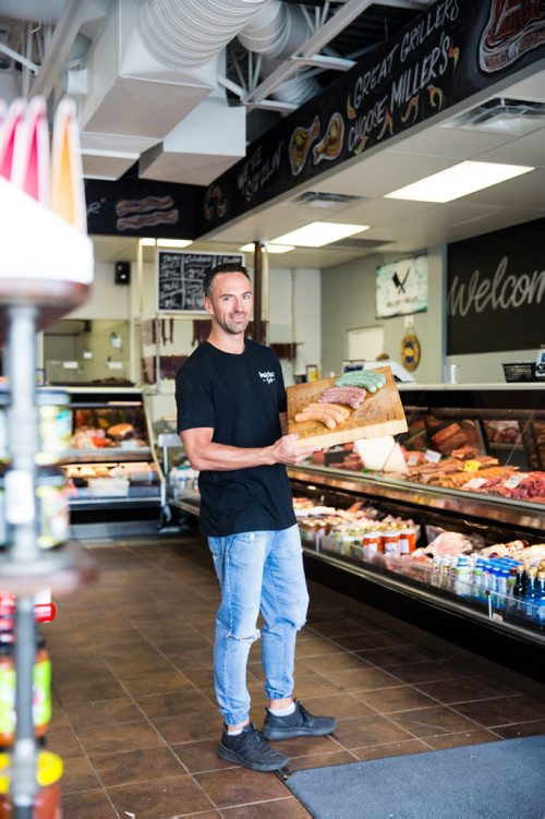 MIKAELA MACKENZIE / WINNIPEG FREE PRESS
Shawn Miller, owner of Miller's Meats, poses for a portrait in their River East location in Winnipeg on Friday, July 12, 2019.
Winnipeg Free Press 2019.