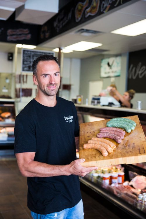 MIKAELA MACKENZIE / WINNIPEG FREE PRESS
Shawn Miller, owner of Miller's Meats, poses for a portrait in their River East location in Winnipeg on Friday, July 12, 2019.
Winnipeg Free Press 2019.