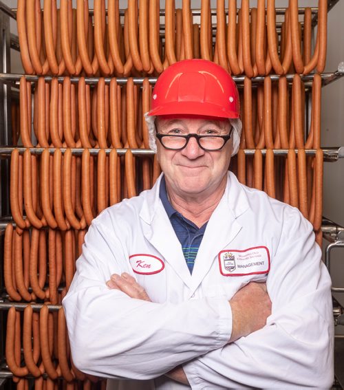 SASHA SEFTER / WINNIPEG FREE PRESS
Owner of Winnipeg Old Country Sausage Ken Werner stands with some of the 24,000 "world-famous wieners" the company produces daily at their facility in Dufferin.
190712 - Friday, July 12, 2019.