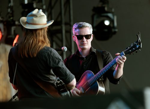 PHIL HOSSACK / WINNIPEG FREE PRESS - Folk Festival- Pete Bernhard and Cooper McBean (left) of The Devil Makes Three on the main stage Friday evening. See story. - July 11, 2019.