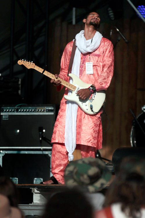 PHIL HOSSACK / WINNIPEG FREE PRESS - Folk Festival- Mdou Moctar feels the groove of his African vibes as he opened the main stage Friday evening.- July 11, 2019.