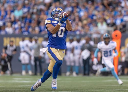 SASHA SEFTER / WINNIPEG FREE PRESS
Winnipeg Blue Bombers wide receiver Nic Demsky catches a touchdown pass in a game against the Toronto Argonauts at IG Field on Friday night.
190712 - Friday, July 12, 2019.