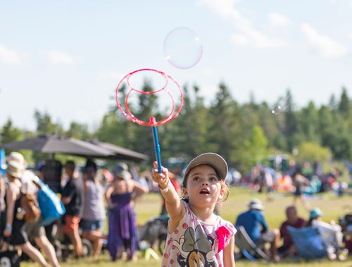 SASHA SEFTER / WINNIPEG FREE PRESS
Sophia (5) makes and chases giant bubbles during the 46th annual Winnipeg Folk Fest held in Birds Hill Park.
190713 - Saturday, July 13, 2019.