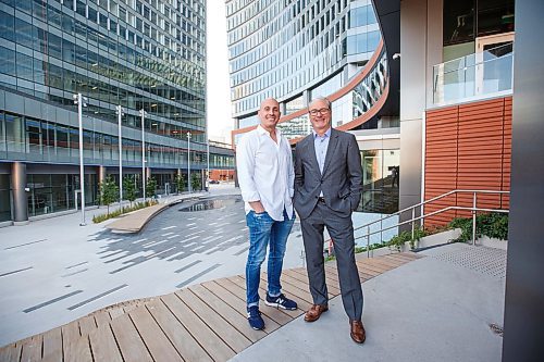 MIKE DEAL / WINNIPEG FREE PRESS
Jim Ludlow (right), president of True North real estate and Bobby Motolla of Pizzeria Gusto (left) at True North Square where a food court is currently under construction and will be opening in the fall.
190716 - Tuesday, July 16, 2019.
