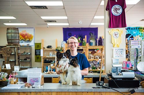 MIKAELA MACKENZIE / WINNIPEG FREE PRESS
Tegan Jacobs, co-owner of Jacobs Trading, poses with pups Vinny (left) and Valentino at the pet-friendly store in Winnipeg on Tuesday, July 23, 2019. For Tessa Vanderhart story.
Winnipeg Free Press 2019.