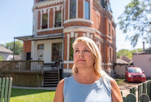 SASHA SEFTER / WINNIPEG FREE PRESS
Executive Director of Heritage Winnipeg Cindy Tugwell stands in-front of 494 College Avenue, a property which under the city's Historical Resources bylaw has been listed on the "commemorative list" but is not safe from demolition or renovation.
190724 - Wednesday, July 24, 2019.