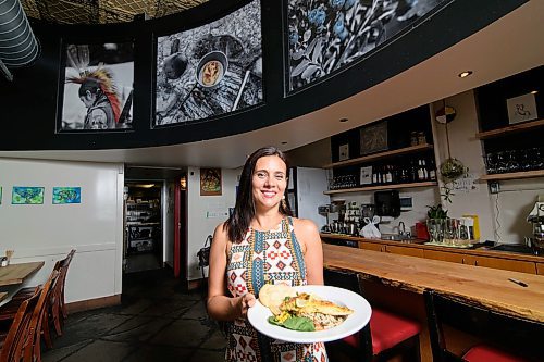 Mike Sudoma / Winnipeg Free Press

Feast Café owner, Christa Bruneau-Guenther shows off her pickerel dinner, a very popular choice on the menu.
190716 - Tuesday, July 16, 2019.