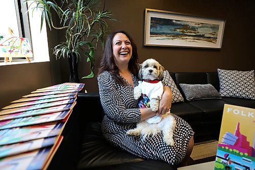 RUTH BONNEVILLE /  WINNIPEG FREE PRESS 

ENT - Teresa Cotroneo ED Folklorama 

Portraits of Folklorama Executive Director  Teresa Cotroneo with office dog Wells taken in her office Tuesday.
 
Description: For Randall King's  Q&A piece.


July 30h, 2019 
