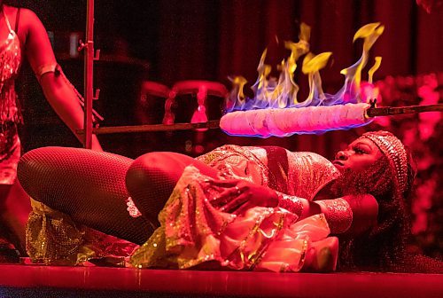 SASHA SEFTER / WINNIPEG FREE PRESS
Performers limbo underneath a flaming pole on the stage at the Caribbean Pavilion to tee out his limbo skills during a Folklorama event held at the Centre Culturel Franco-Manitobain in Saint Boniface Sunday evening.
190804 - Sunday, August 04, 2019.