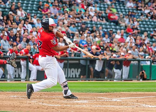 SASHA SEFTER / WINNIPEG FREE PRESS
Winnipeg Goldeyes leftfielder Tyler Hill (27) connects with the ball  during a game against the Lincoln Saltdogs at Shaw Park Tuesday evening.
190806 - Tuesday, August 06, 2019.