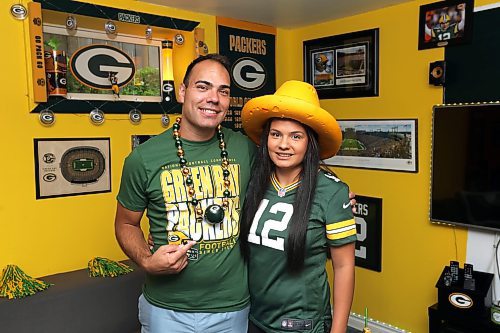SASHA SEFTER / WINNIPEG FREE PRESS

Jesse (left) and Janeen Martin are Green Bay Packers super-fans. Jesse has transformed his basement into the ultimate packers man cave with memorabilia covering every wall. 

190821 - Wednesday, August 21, 2019.
