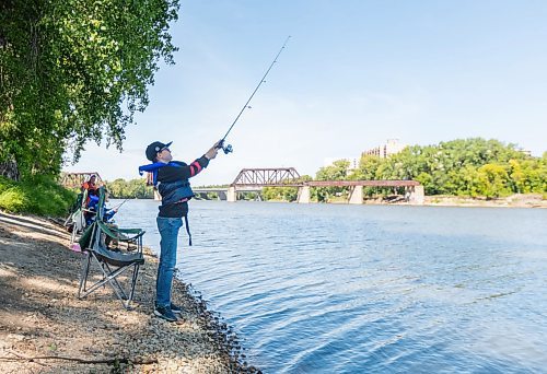 SASHA SEFTER / WINNIPEG FREE PRESS
Andrew Klassen (10) sends his bait flying with a big cast while taking part in a Fish Winnipeg Youth at Risk Fishing Program on the banks of the Red River in Kildonan Park Friday afternoon.
190823 - Friday, August 23, 2019.