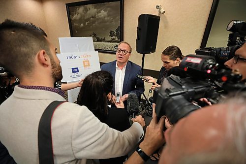 RUTH BONNEVILLE /  WINNIPEG FREE PRESS

Local - Pallister presser

Manitoba progressive conservative party Finance Minister, Scott Fielding, answers questions from the media after Brian Pallister's news conference with PC candidates at Canad Inns on Thursday.

See  story.

Aug 29th  2019